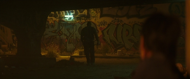 Wide shot frame from Hotel Artemis — standing, person