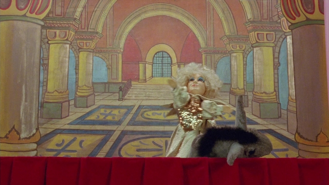Frame from In the Mouth of Madness — sitting, standing, animal