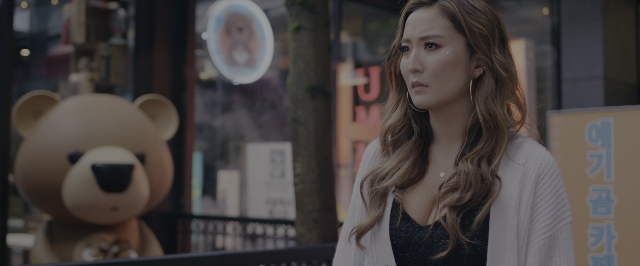 Wide shot frame from Joy Ride — standing, street, face