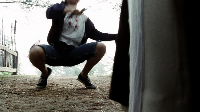 Wide shot frame from Kill Bill: Vol. 2 — shirt, person, footwear