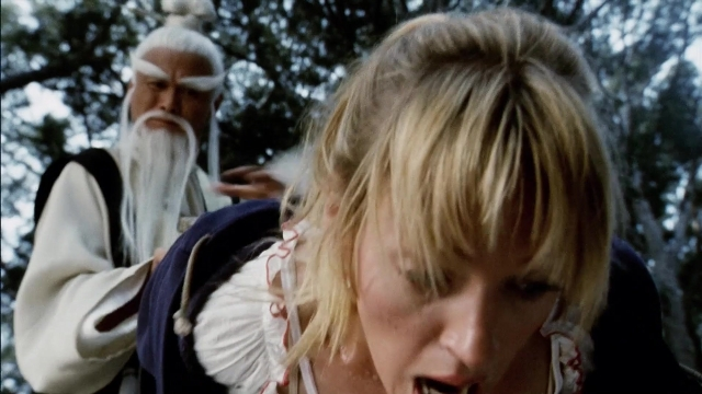 Wide shot frame from Kill Bill: Vol. 2 — standing, beard, hair