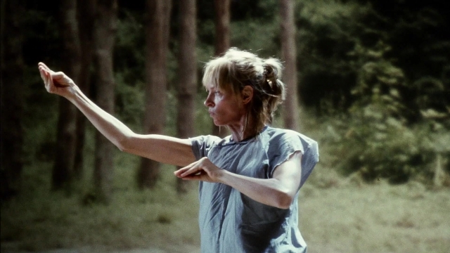 Wide shot frame from Kill Bill: Vol. 2 — standing, shirt, hair