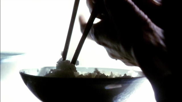 Wide shot frame from Kill Bill: Vol. 2 — plate, hand, bowl