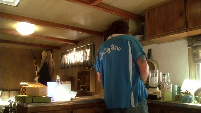 Wide shot frame from Kill Bill: Vol. 2 — standing, room, kitchen