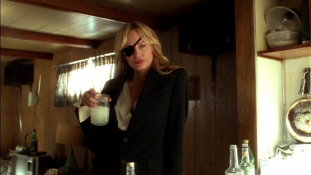 Frame from Kill Bill: Vol. 2 — standing, kitchen, suit