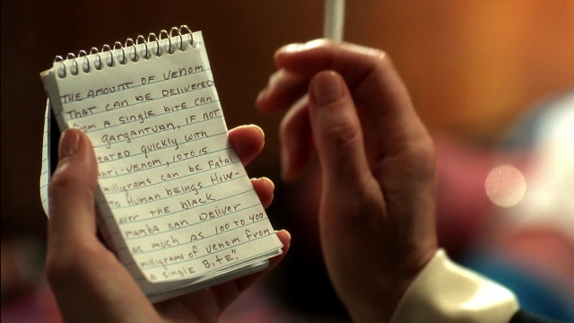 Wide shot frame from Kill Bill: Vol. 2 — suit, tie, person