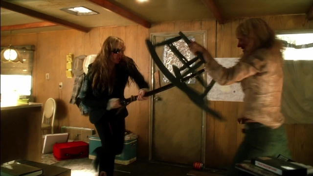 Wide shot frame from Kill Bill: Vol. 2 — standing, room, door