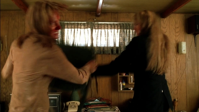 Wide shot frame from Kill Bill: Vol. 2 — standing, room, phone