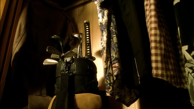Wide shot frame from Kill Bill: Vol. 2 — room, shirt, bag