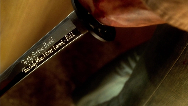 Wide shot frame from Kill Bill: Vol. 2 — table, knife