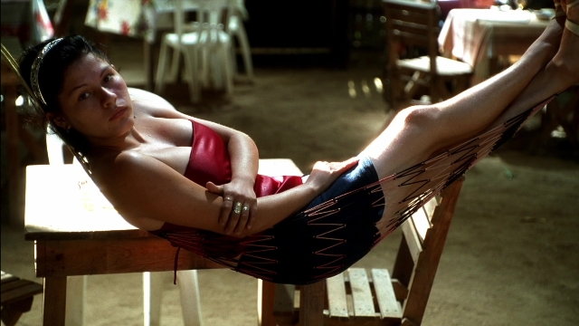Wide shot frame from Kill Bill: Vol. 2 — table, restaurant, chair