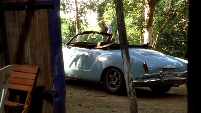 Wide shot frame from Kill Bill: Vol. 2 — plate, street, car