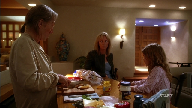 Wide shot frame from Kill Bill: Vol. 2 — sitting, standing, plate