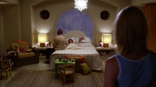 Wide shot frame from Kill Bill: Vol. 2 — sitting, standing, room