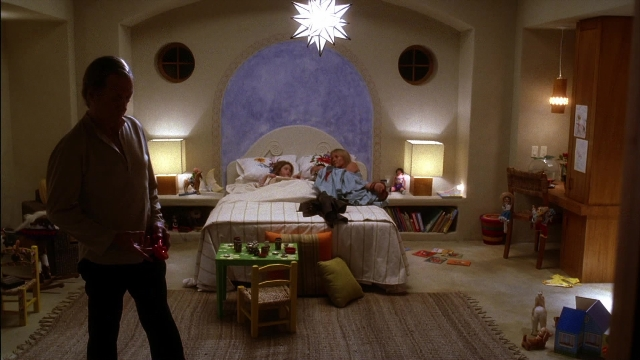 Wide shot frame from Kill Bill: Vol. 2 — standing, room, table