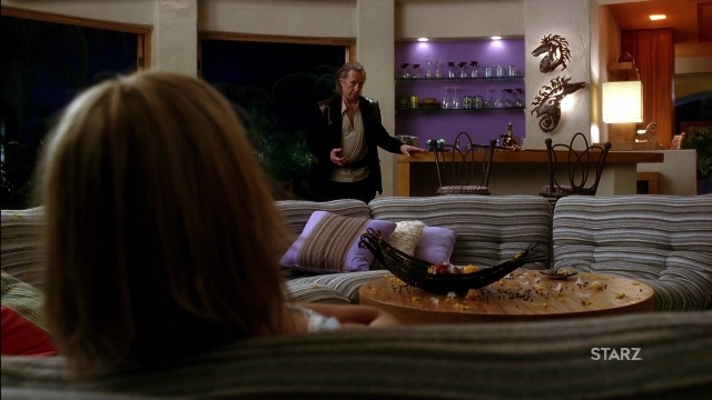 Wide shot frame from Kill Bill: Vol. 2 — sitting, standing, room