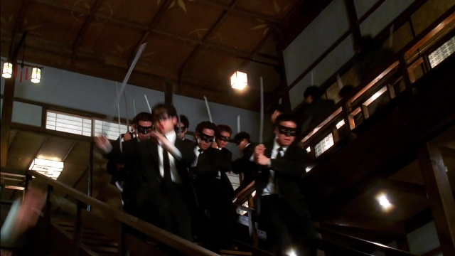 Medium shot frame from Kill Bill: Vol. 2 — standing, room, person