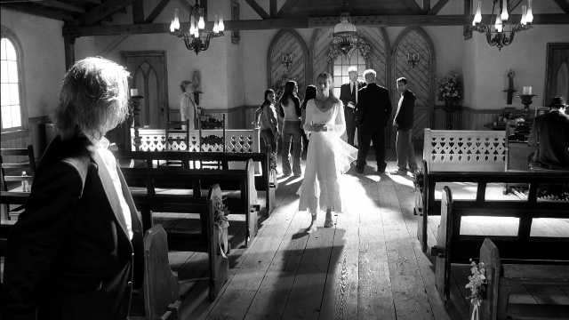 Wide shot frame from Kill Bill: Vol. 2 — standing, walking, hand