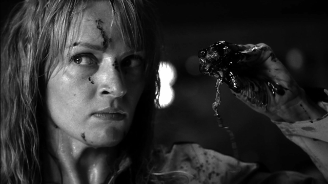Close-up frame from Kill Bill: Vol. 2 — hand, face, hair