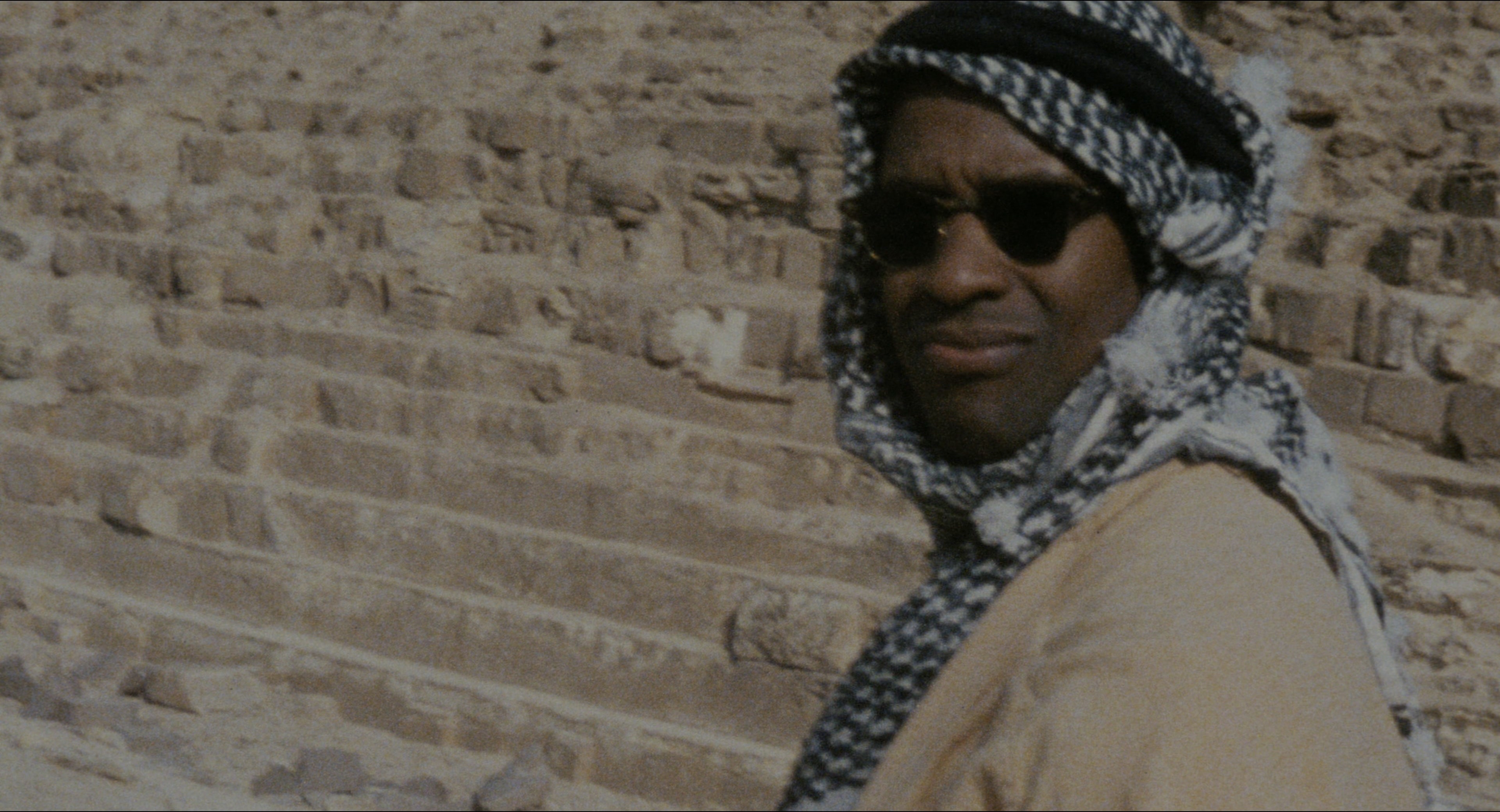 Malcolm (1992), wide, 1.85:1 — film still