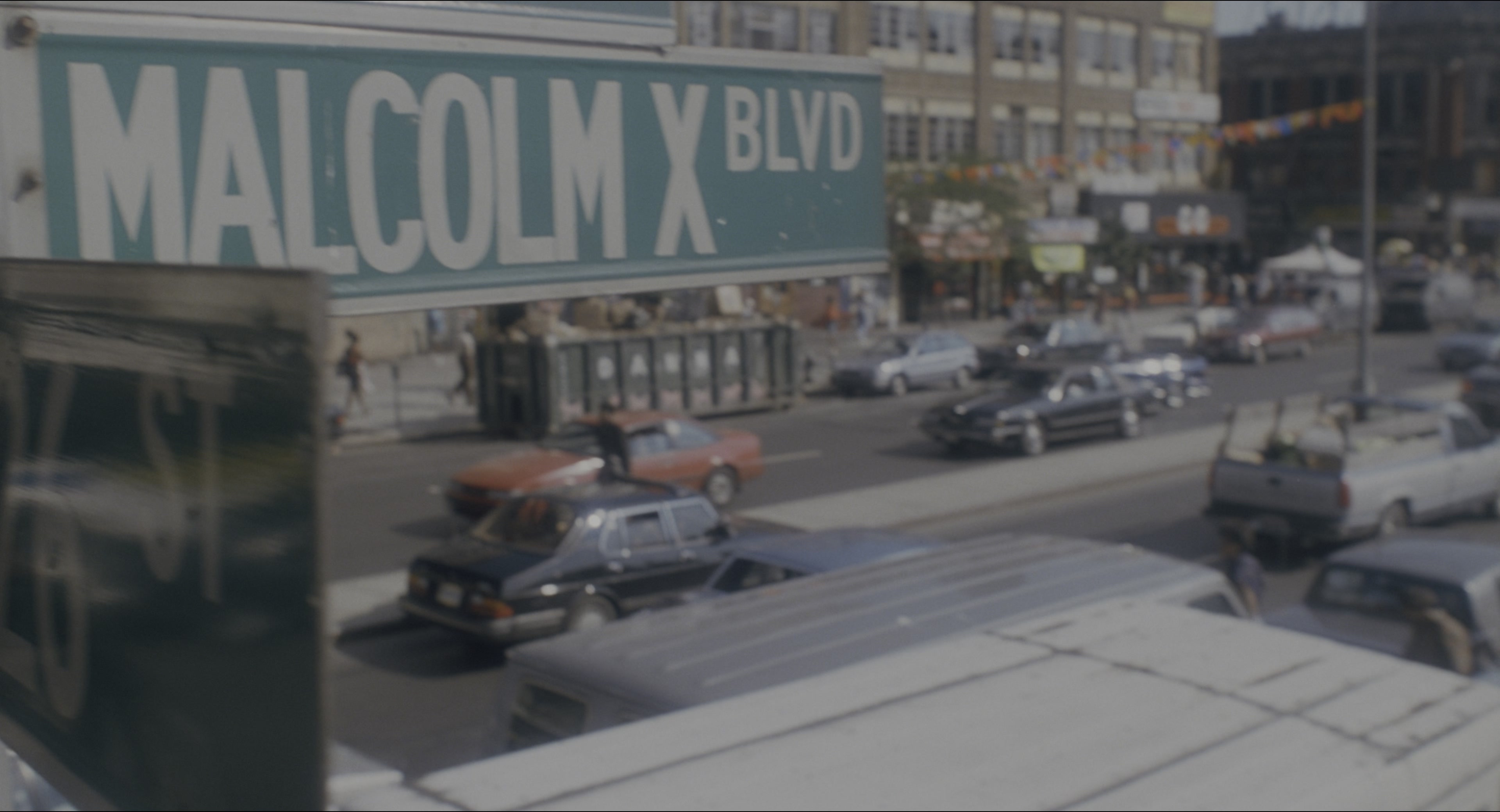 Malcolm (1992), wide, 1.85:1 — film still