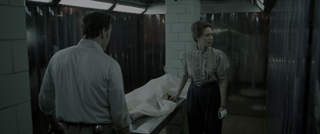 Wide shot frame from The Conjuring: The Devil Made Me Do It — standing, room, bed