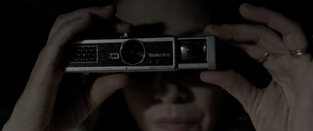 Frame from The Conjuring: The Devil Made Me Do It — room, face, camera