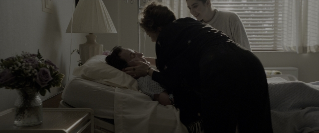 Wide shot frame from The Conjuring: The Devil Made Me Do It — room, bed, bedroom
