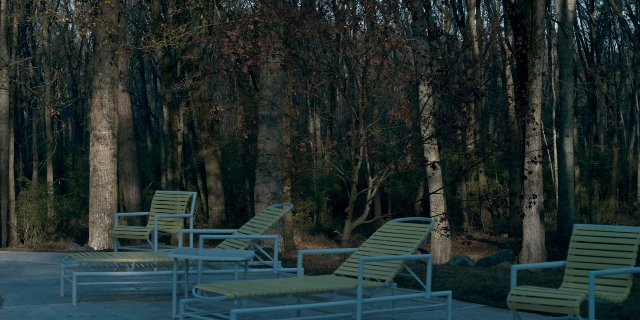 Wide shot frame from Stranger Things — table, chair