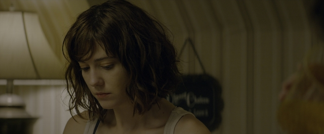 Medium shot frame from 10 Cloverfield Lane — people, action, show