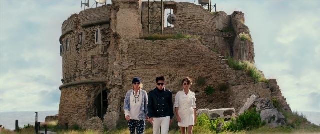 Wide shot frame from Zoolander 2 — standing, dress, shirt