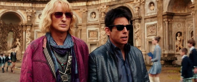 Wide shot frame from Zoolander 2 — standing, walking, face