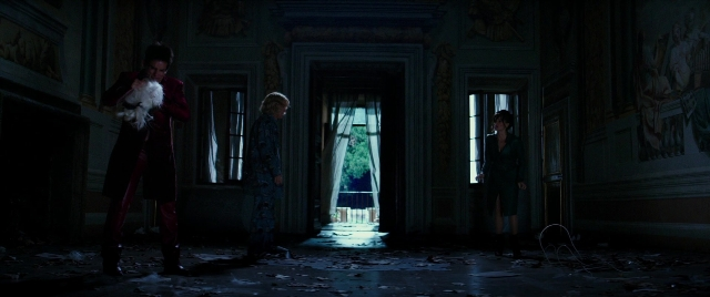 Wide shot frame from Zoolander 2 — standing, room, door