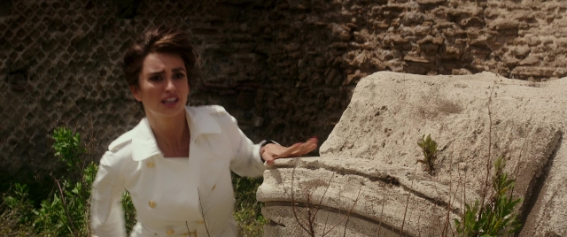 Wide shot frame from Zoolander 2 — standing, coat, face