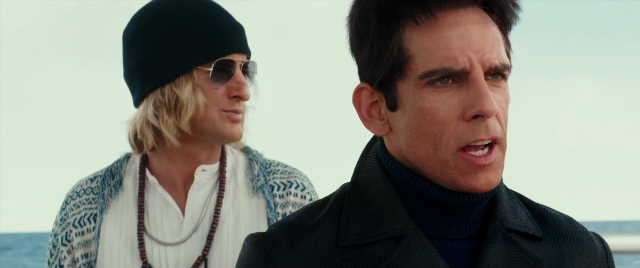 Medium shot frame from Zoolander 2 — standing, dialogue, coat
