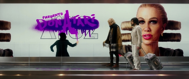 Medium shot frame from Zoolander 2 — walking, coat, hand