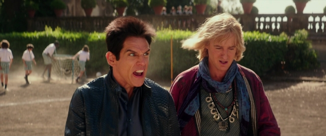 Wide shot frame from Zoolander 2 — standing, walking, dialogue