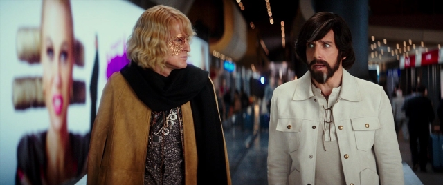 Wide shot frame from Zoolander 2 — standing, walking, coat