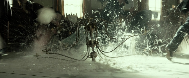 Wide shot frame from The Lone Ranger — room, fire, water