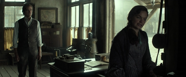 Wide shot frame from The Lone Ranger — book, standing, room