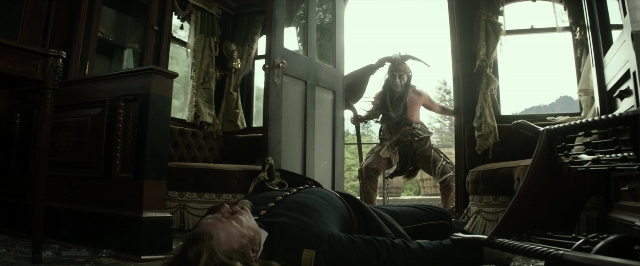 Wide shot frame from The Lone Ranger — standing, room, table