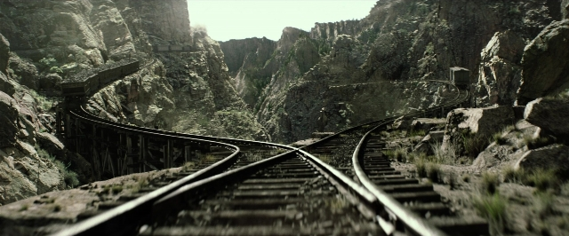 Wide shot frame from The Lone Ranger — train, stairs