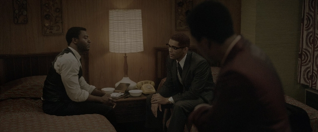 Wide shot frame from One Night in Miami — sitting, room, dialogue