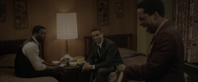 Wide shot frame from One Night in Miami — sitting, room, dialogue