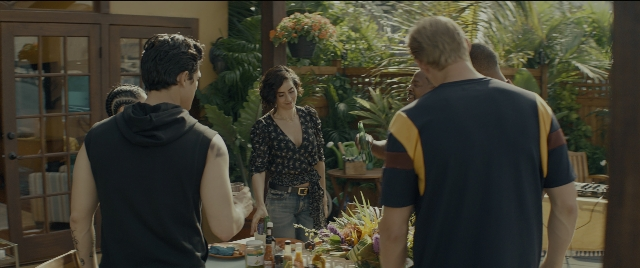 Wide shot frame from Bad Boys for Life — standing, plate, table