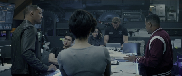Wide shot frame from Bad Boys for Life — sitting, room, table