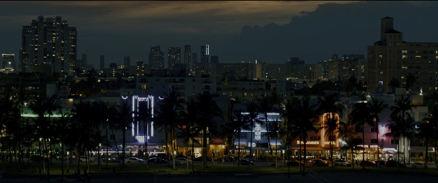 Wide shot frame from Bad Boys for Life — street, night, water
