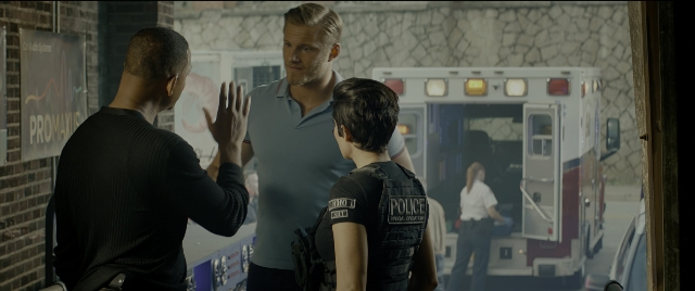 Wide shot frame from Bad Boys for Life — standing, room, street