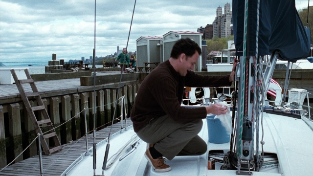 Wide shot frame from You've Got Mail — water, boat, person