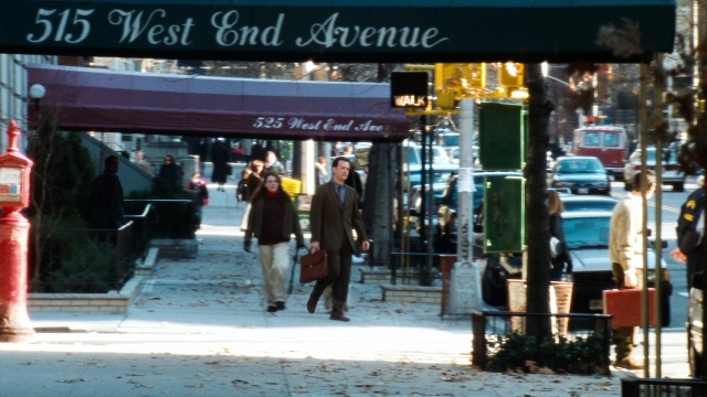 Wide shot frame from You've Got Mail — walking, street, person
